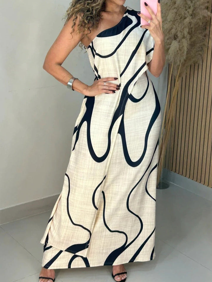 Off-shoulder maxi-jurk met abstracte patroon